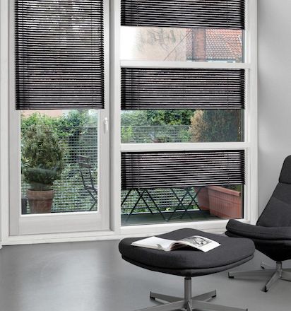 aluminium blinds in different shaped windows in living room