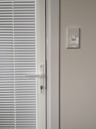 aluminium blind installed on a door