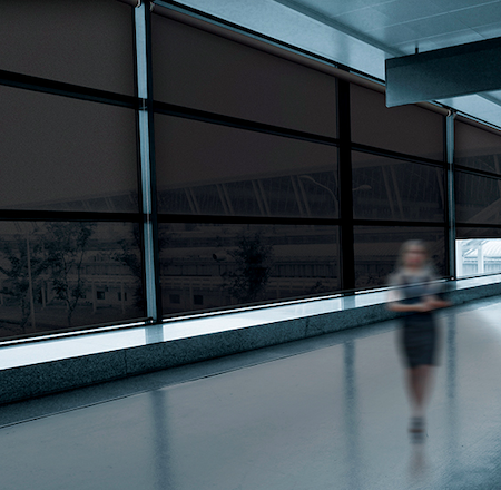 large sunscreen blinds in office foyer environment