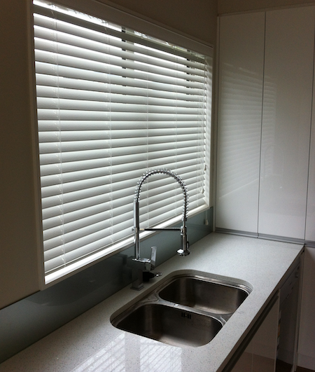 pvc blinds over the kitchen sink