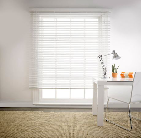 large white pvc blind in a home study area