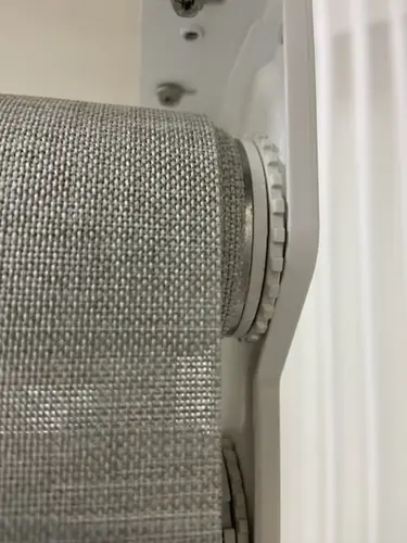 Close-up of the SmartBlock blind tension adjustment dial inside the cassette