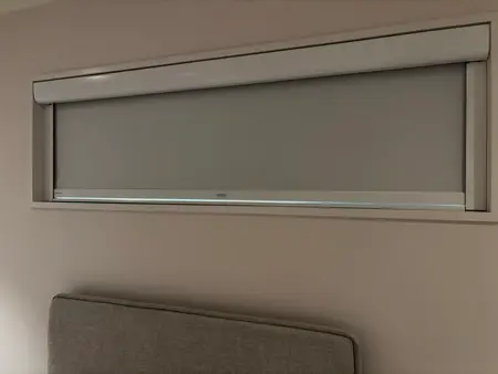 SmartBlock blackout blind with a slight gap at the bottom channel